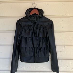 Diane Von Furstenberg, 100% genuine black leather jacket with ruffles, size 4